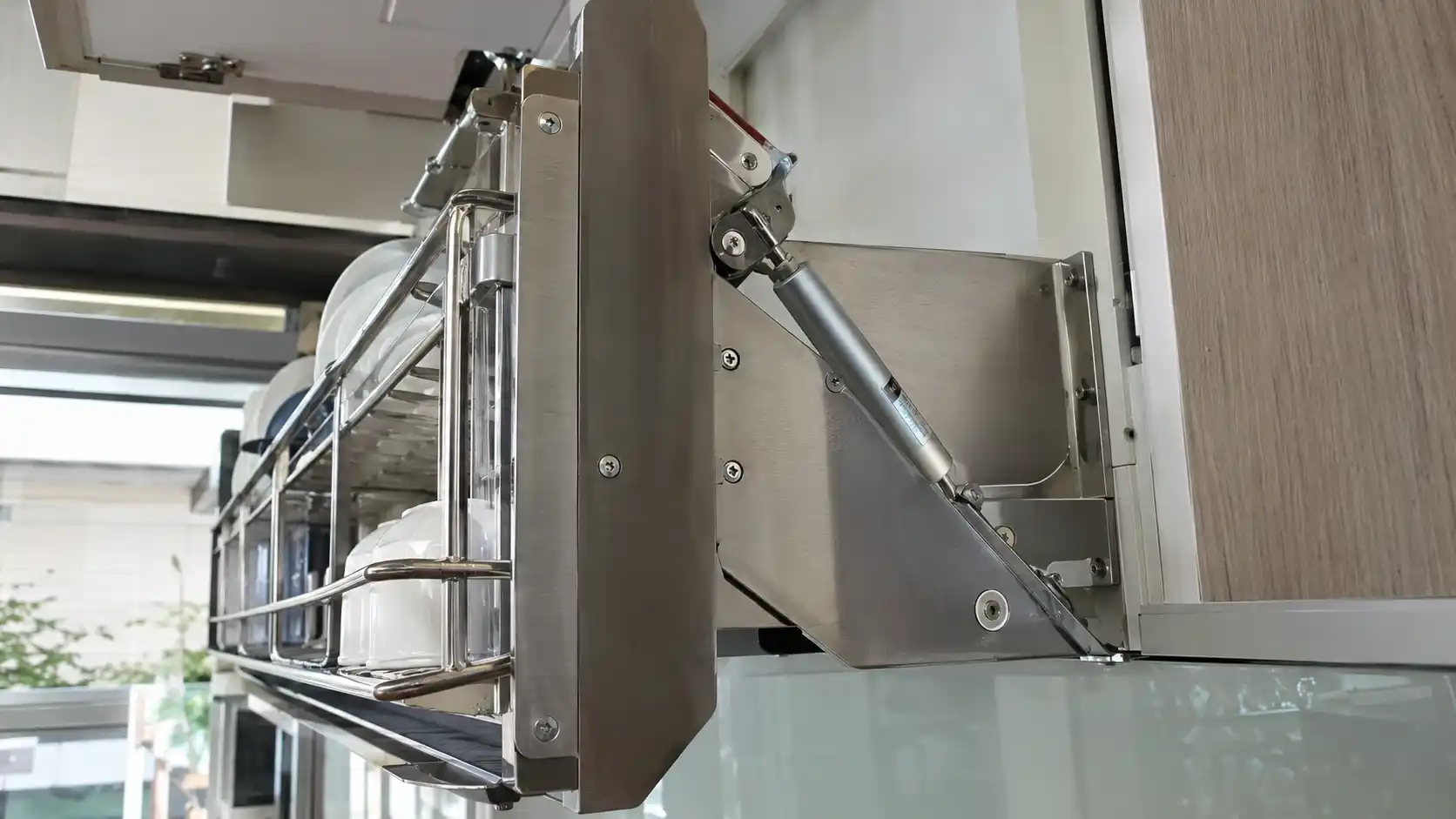 Cơ cấu hộp trợ lực lò xo và piston thủy lực của giá bát nâng hạ